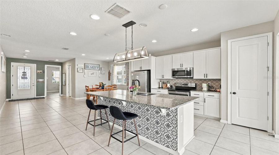 Kitchen + Dining, Looking At Front Door, First Bedroom And Full Bath