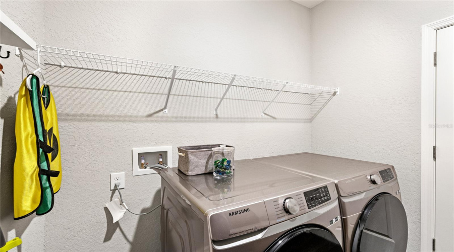 Laundry Room Off Of Kitchen Leads To 2 Car Garage.  Additional Counterspace Across From Washer &Amp; Dryer