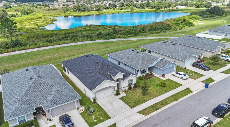Aerial Pond View Behind Home