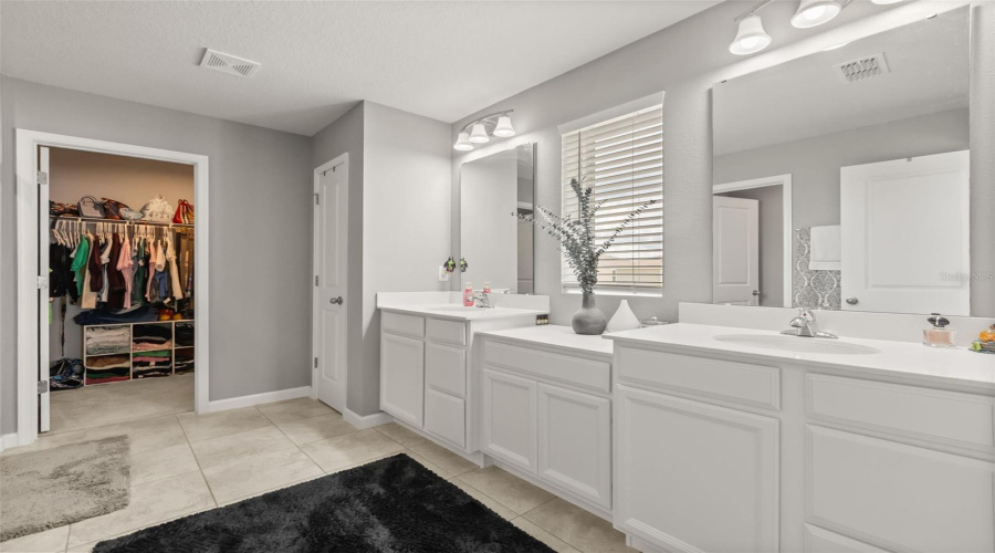 Primary Bath With  Double Vanities, Linen Closet,  &Amp; Second Walk-In Closet.