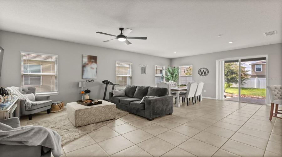 Family Room To Dining Area With Sgd To Covered Lanai.