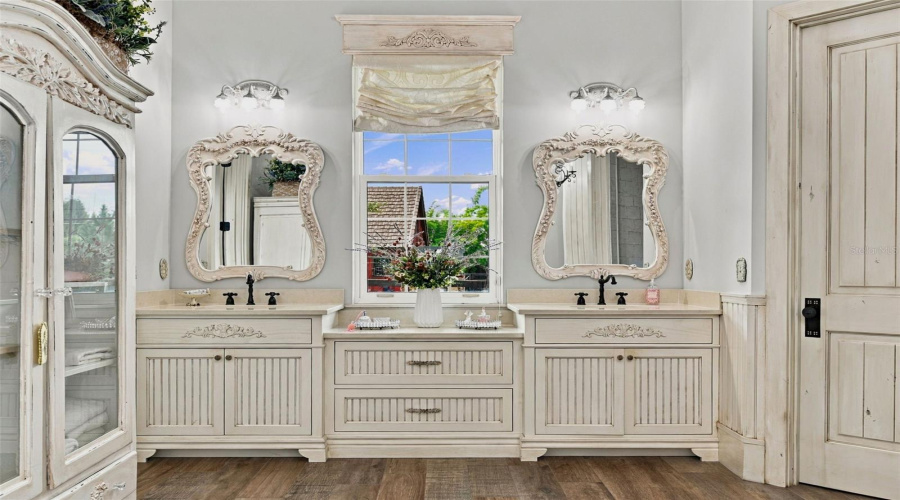 Custom Cabinetry By Disney Cabinetmaker- 2 Raised Vanities And 1 Lower Walk-In Closet