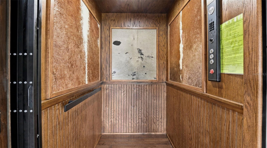 Private Elevator Next To Stairs