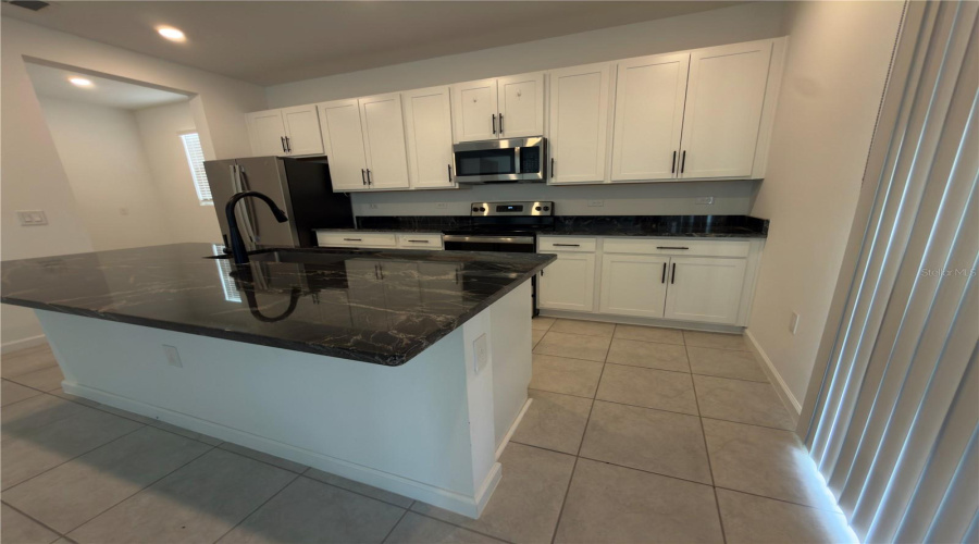 Davenport, Florida 33837, 5 Bedroom Bedrooms, ,3 Bathroombathrooms,Residential,For Sale,Sugarwood,0,Mfrs5158878