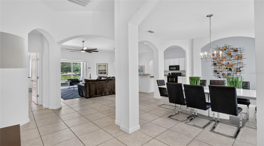 Dining Room To The Right With Family Room Straight Ahead