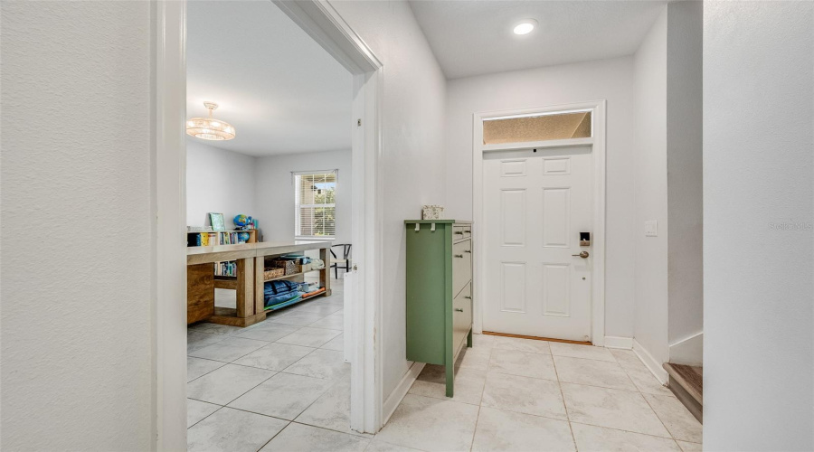 Back Downstairs, Foyer Has Access Door Into Multi-Gen Suite, And There'S A Separate Exterior Entrance To The Multi-Gen Suite