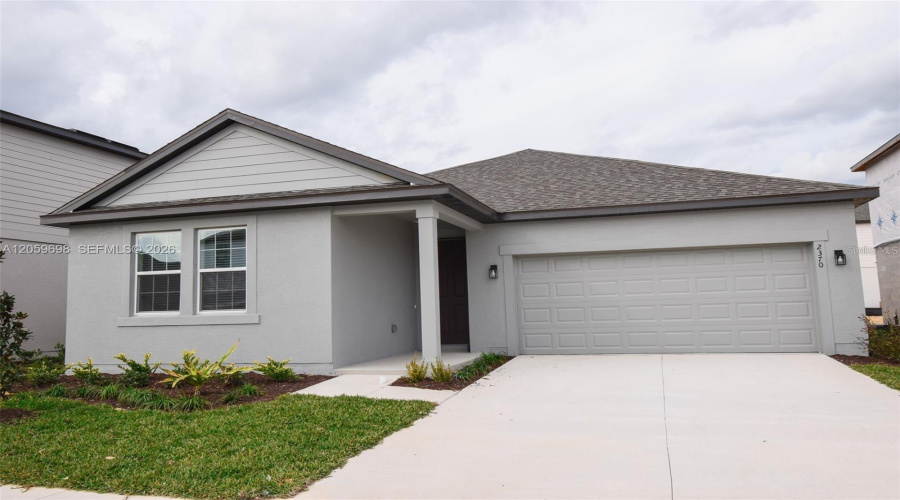 Beautiful Front Elevation With Two-Car Garage