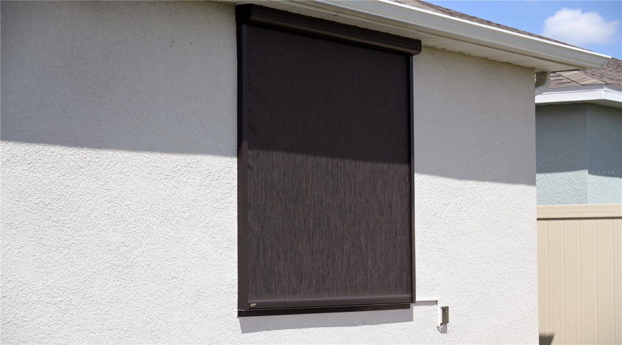 Motorized Screen Covering Master Bedroom Window