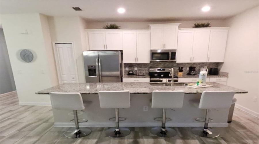 Davenport, Florida 33896, 4 Bedroom Bedrooms, ,3 Bathroombathrooms,Residential,For Sale,Dogleg,0,Mfrs5126086