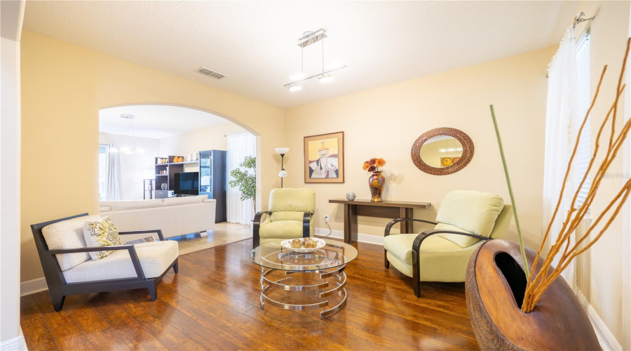 Main-Floor Flex Room, Ideal As A Home Office Or Reading Area