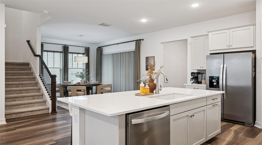 Kitchen Overlooks Living And Dining Rooms