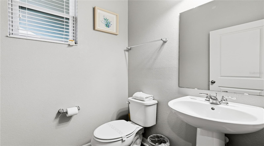 Half Bathroom By The Entrance