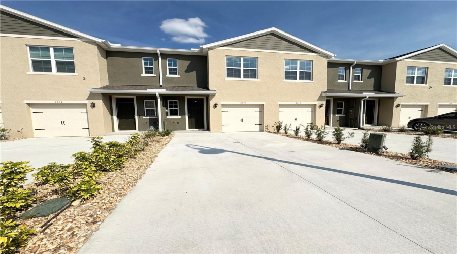 View Of Long Driveway, Entrance And One Car Garage.