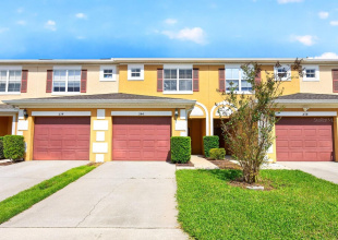 Enjoy easy, LOW MAINTENANCE townhome living in the GATED Towns of Legacy Park community in Davenport, just 15 minutes from Disney parks!